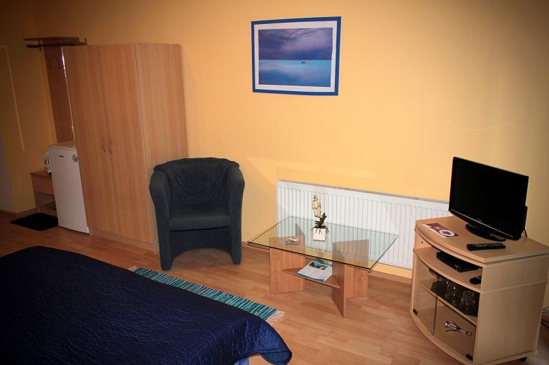 Třílůžkový pokoj s terasou Třílůžkový pokoj s terasou