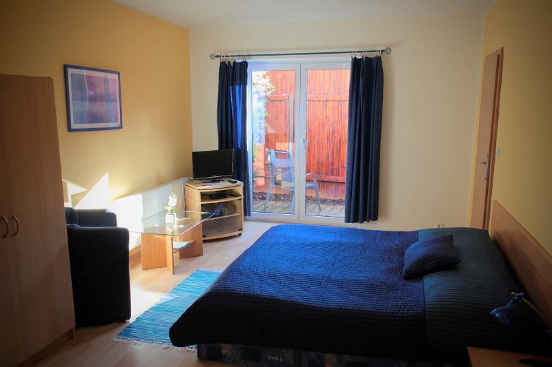 Třílůžkový pokoj s terasou Třílůžkový pokoj s terasou