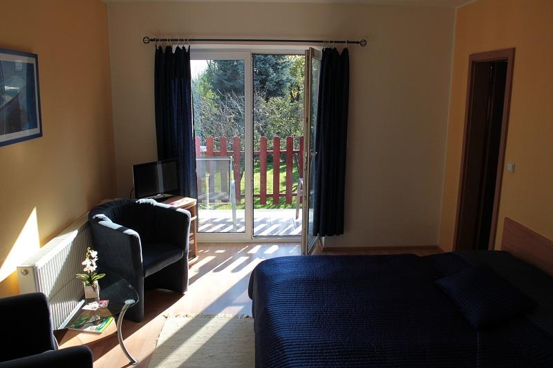 Třílůžkový pokoj s terasou Třílůžkový pokoj s terasou