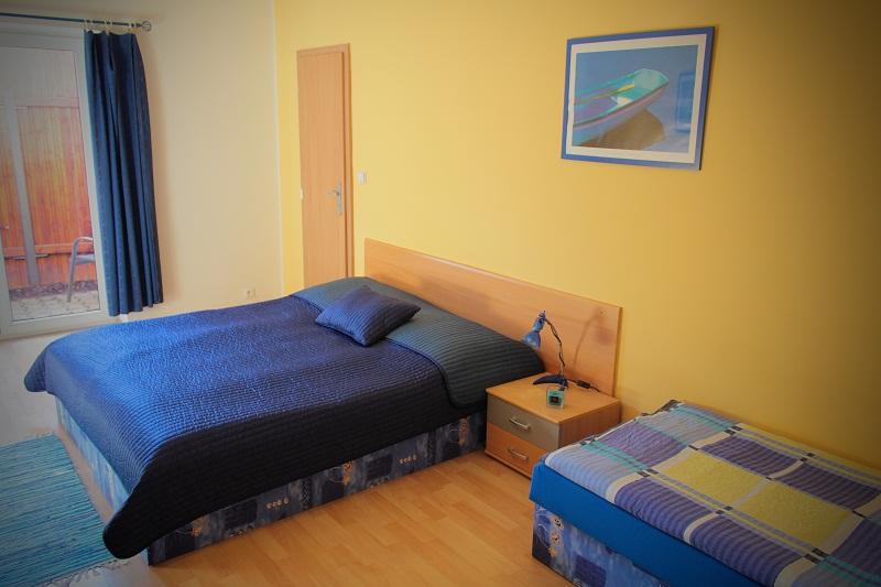 Třílůžkový pokoj s terasou Třílůžkový pokoj s terasou