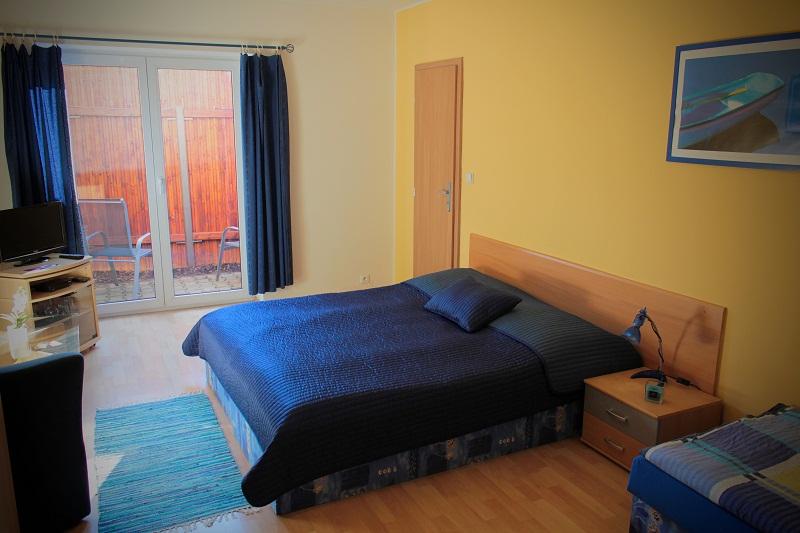 Třílůžkový pokoj s terasou Třílůžkový pokoj s terasou