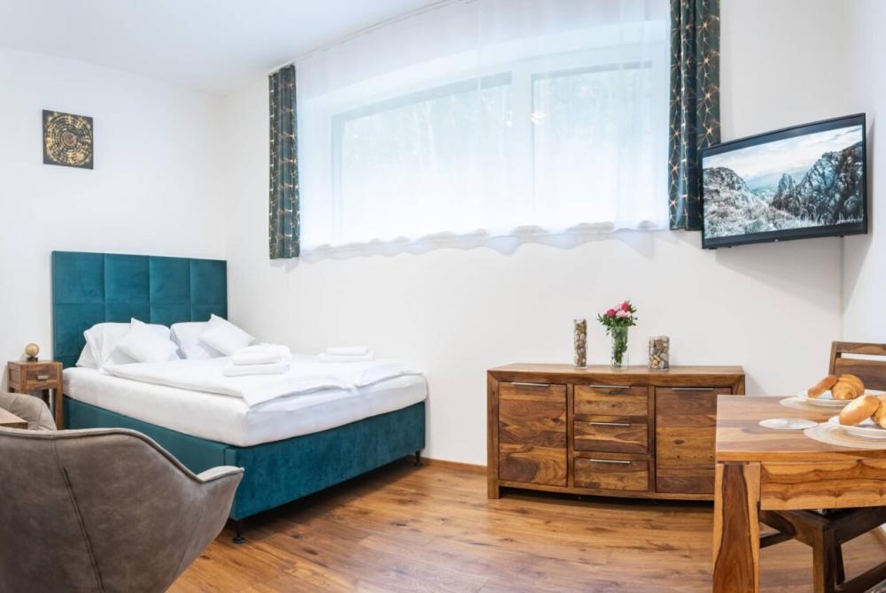 Luxusní apartmán KRKONO?E se slu?bami a mo?ností privátního wellness