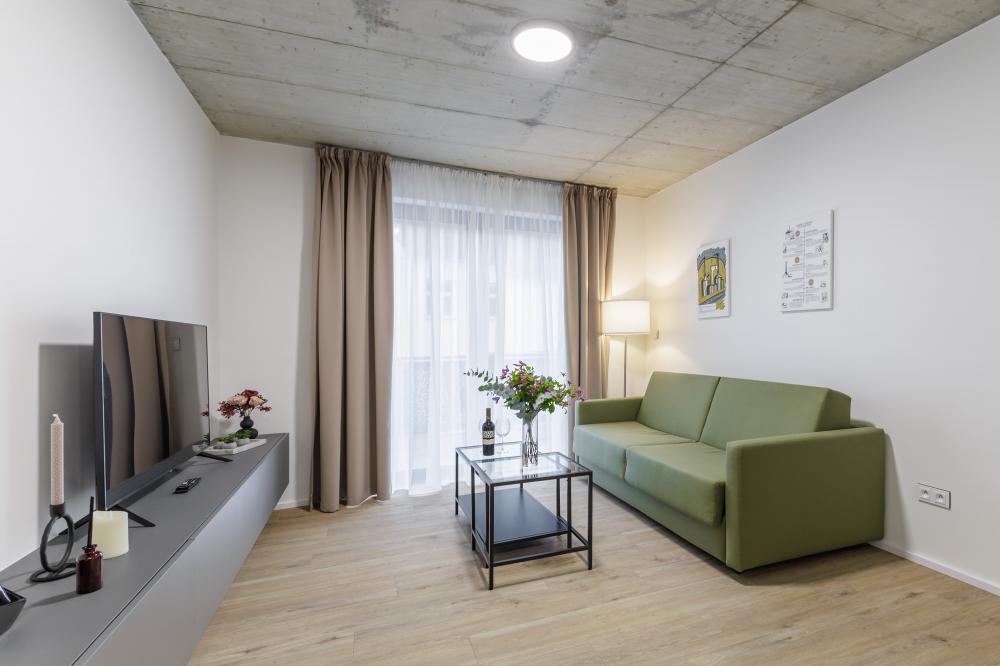 Dvoulůžkový apartmán DELUXE s rozkládací pohovkou a terasou