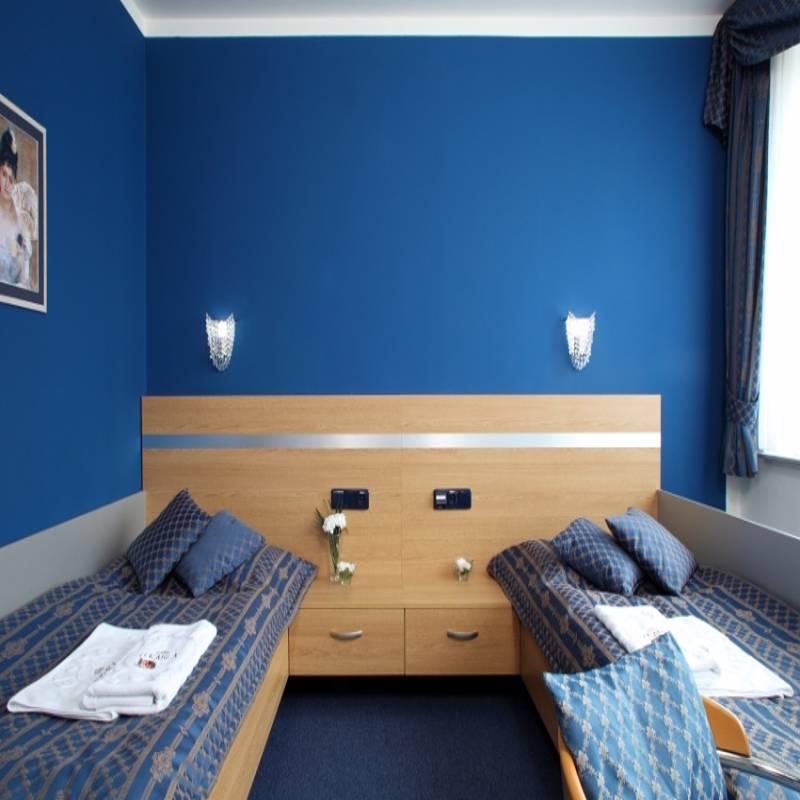 Dvoulůžkový pokoj s oddělenými postelemi