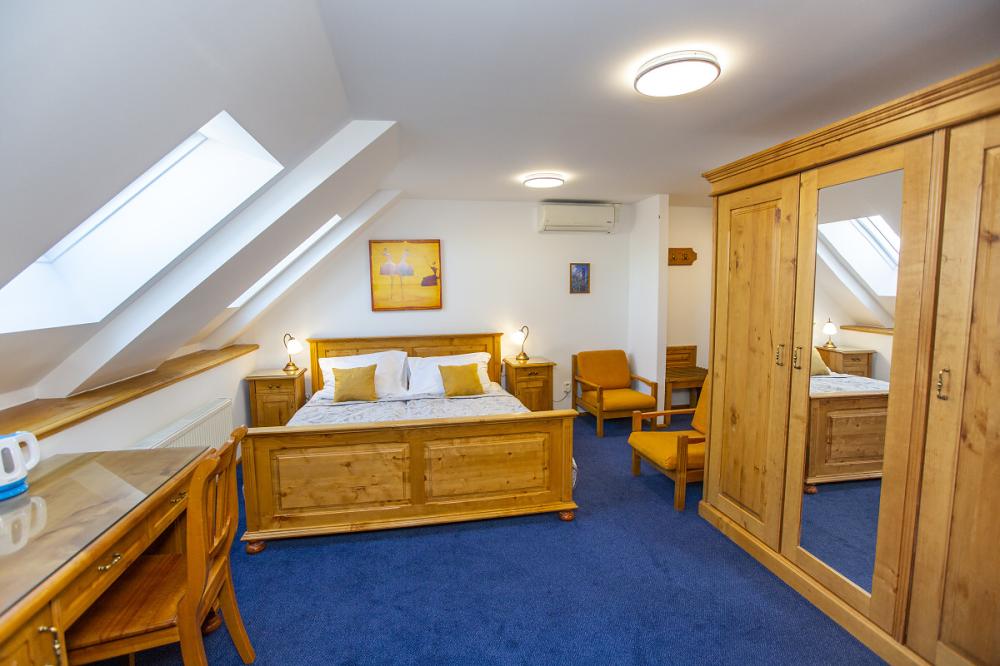 Třílůžkový pokoj